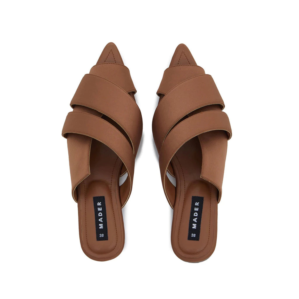 A pair of bronze open toe mules with double strap and low heel