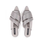 A pair of gray open toe mules with double strap and low heel.