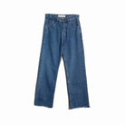 A pair of high-waisted, wide leg blue jeans by Rashawl with a straight fit and raw hem.