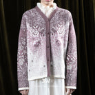 Person wearing a purple patterned cardigan by BWBYAZ over a white shirt against a dark background
