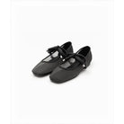 Black mesh shoes by Cajsa with bow details on a white background