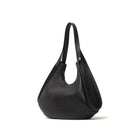 A black leather handbag with a zipper closure and a shoulder strap from purotti.