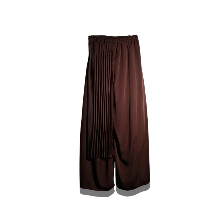 Brown pleated barrel pants by Rashawl on a white background