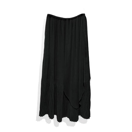 A black pleated layered skirt by Rashawl on a plain background.