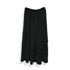 A black pleated layered skirt by Rashawl on a plain background.