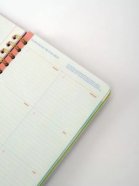 Open planner on a white background