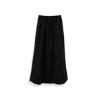 A solid black Tsubaki Silk Skirt by Rashawl with a long length and elastic waistband.