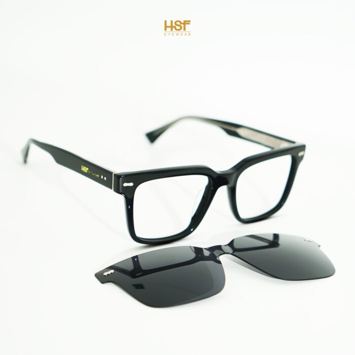 Black sunglasses with clip-on lenses by Eyewear on a white background