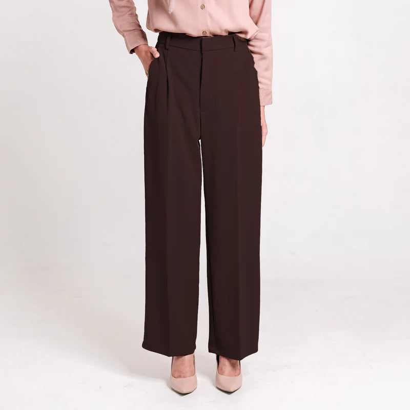 Brown wide-leg culotte pants from Atala Scarves worn with a light pink blouse on a white background